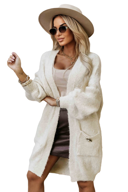 20880-11-628-1 Fashionable oversized cardigan with a decorative brooch and practical pockets - beige-11